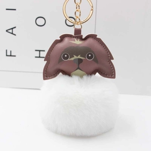 Cute puppy plush keychain with brown leather dog head and large white fluffy pompom charm