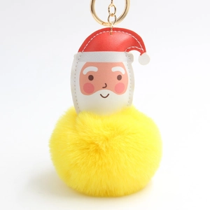 Christmas Santa Claus PU leather pendant with a bright yellow pom-pom and golden keychain