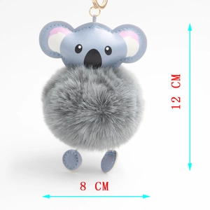 Detailed view of the 12cm grey fluffy koala fur ball keychain with dimensions and gold clip