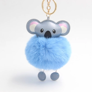 Cute sky blue koala keychain featuring a fluffy faux fur pompom and golden metal ring