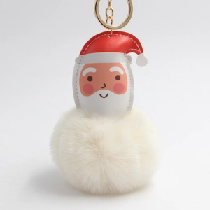 Detail of Santa Claus leather charm with large fluffy white pom pom and golden ring