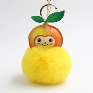 Creative plush fruit keychain with yellow faux fur ball and cute cartoon peach pendant