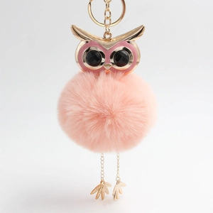 Pink fluffy owl keychain with gold metal owl head and plush faux fur ball charm