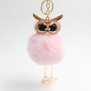 Pink faux fur owl keychain with golden metal head and black gemstone eyes for bags