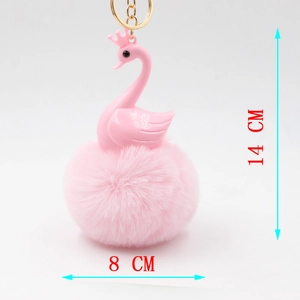 Detailed view of pink swan keychain with soft plush pompom and size measurements
