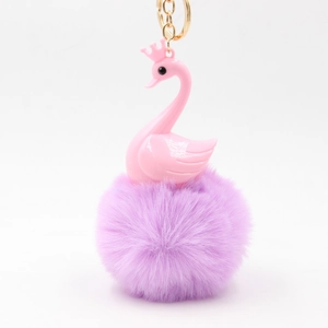 Pink swan plush keychain with purple faux fur ball and golden metal ring for bags