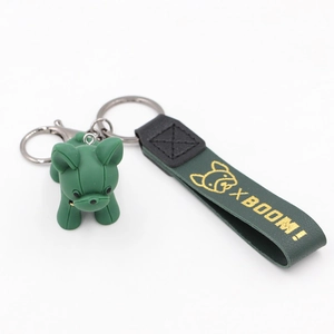 Porte-clés bouledogue vert foncé avec finition mate et accessoire de sangle en cuir