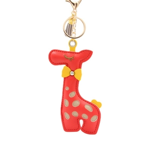 Cartoon PU leather red giraffe keychain with yellow bow and tassel bag accessory