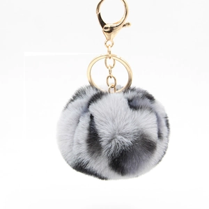 Plush 8cm leopard print pom-pom keychain with gold-tone lobster clasp for bags and car keys