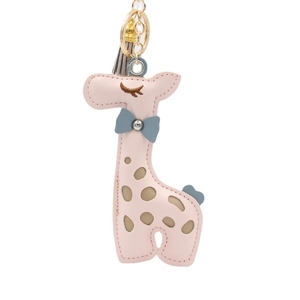 Pink PU leather giraffe keychain with a blue bow, gray tassel, and golden hardware