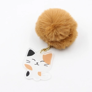 Porte-clés chat tricolore en acrylique avec pompon marron et chaîne dorée
