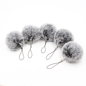 Set of five premium fluffy pom-pom keychains in grey and white with metal rings and lanyards