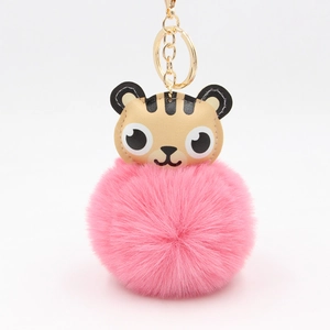 Porte-clés tigre mignon avec pompon en fourrure rose et anneau en métal doré brillant