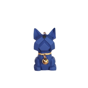 Close-up of geometric resin French Bulldog charm with gold collar and bell on white backdrop