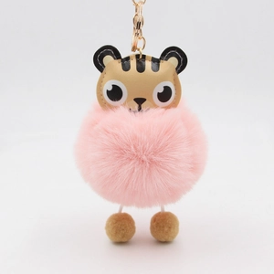 Cute PU leather tiger head keychain with large pink faux fur pompom and gold ring