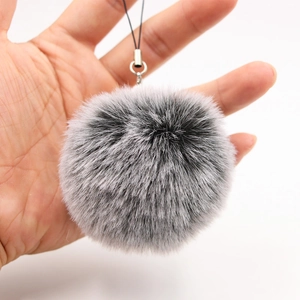Handheld dark grey faux fur pompom keychain accessory for bags and phone decoration