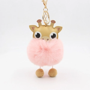 Pink plush ball reindeer keychain with gold metal clasp and brown leather antlers