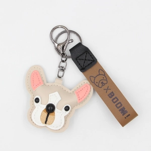 Cute leather French Bulldog keychain with beige dog head and brown leather hand strap charm