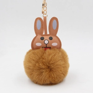 Mignon Porte-clés Lapin en Peluche Pompon pour Femmes Pendentif de Sac Animal en Cuir Artificiel Boule de Fourrure Douce en Polyester Anneau de Clé