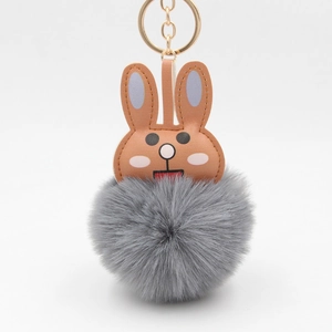 Porte-clés lapin mignon avec pompon en fausse fourrure grise et anneau doré pour sac