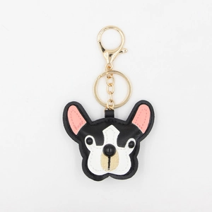 Detail of cute PU leather French Bulldog keychain with gold metal lobster clasp and ring