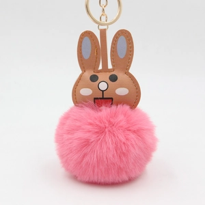 Porte-clés lapin en fausse fourrure avec tête en cuir marron et anneau doré