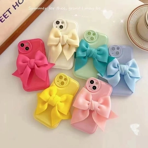 Macaron color phone case for iPhone with large decorative fabric bow accessory