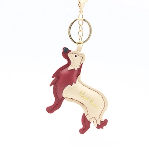 Cute golden retriever leather keychain in burgundy and beige with gold metal lobster clasp