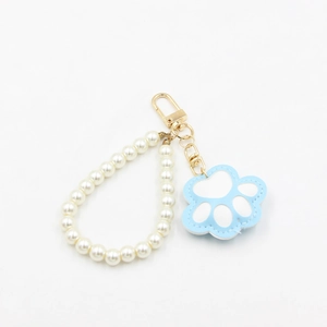 Porte-clés en perles créatif avec pendentif patte de chat en cuir bleu et blanc et clip