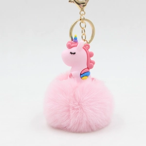 Porte-clés licorne rose avec pompon en peluche et anneau doré pour sac à main