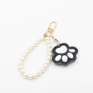 Porte-clés en perles fait main avec breloque patte de chat mignonne et crochet doré