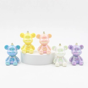 Pearlescent resin bear keychains in five holographic colors with golden rings