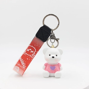 Cartoon white bear keychain with pink heart sweater and gradient lanyard accessory