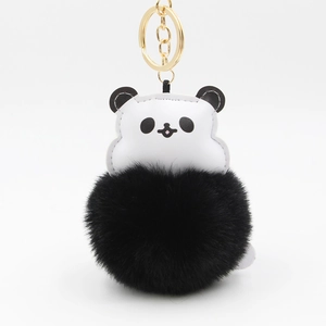Cute panda pom pom keychain with fluffy black faux fur and golden metal ring