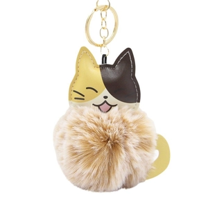 Porte-clés chat en peluche avec visage en cuir calicot et pompon marron doux