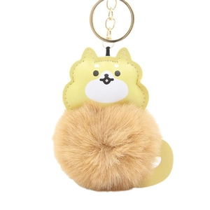 Cartoon shiba inu plush ball keychain with golden metal ring and soft fur texture