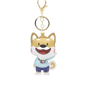 Cartoon Shiba Inu puppy keychain accessory with gold ring and blue outfit on white background