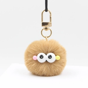 Brown plush 4cm pompom keychain with big eyes and gold metal clasp for bags and keys