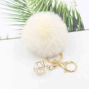 Creamy white 8cm faux fur pompom keychain with golden crystal geometric pendant charm