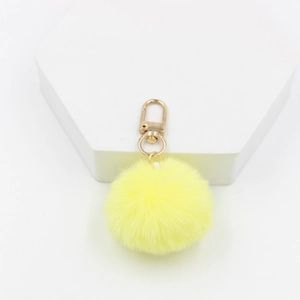 Bright yellow 4cm faux fur pompom keychain with golden lobster clasp for bags and keys