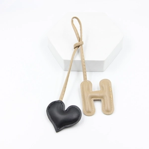 Cute PU leather heart and letter H keychain charm for handbags in black and khaki