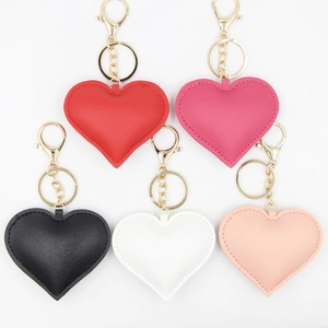 Porte-Clés Classique en Forme de Cœur en Cuir PU Charme de Sac Cœur Mignon pour Femmes Accessoires de Suspension de Voiture