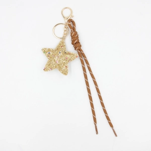 Cute gold sequin star keychain with brown woven strap and lobster clasp for bag decoration