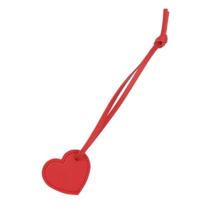 Minimalist red leather heart keychain charm with stitch detail for bags and car keys