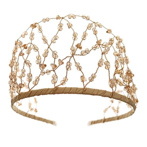 Detailed close-up of handmade bridal headband with amber crystals and champagne gold beads