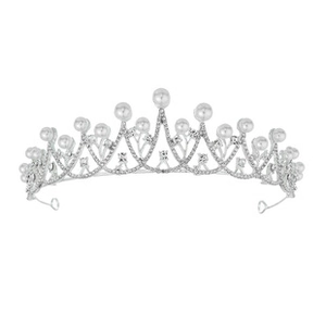 Macro detail of bridal crown featuring silver finish with white pearls and rhinestones