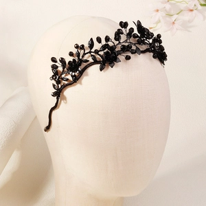 Detailed view of Gothic black crystal flower crown with intricate floral vine metalwork