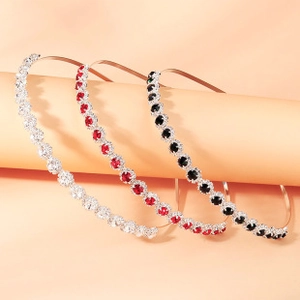 Three-piece metal headbands set featuring rhinestones in silver, red, and black colors