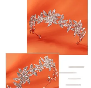 Macro detail of silver bridal crown featuring leaf motifs and sparkling rhinestones