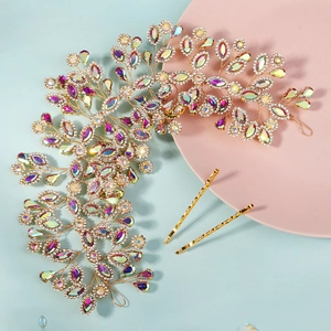 Detail view of a luxury handmade crystal bridal headband set with gold floral accents